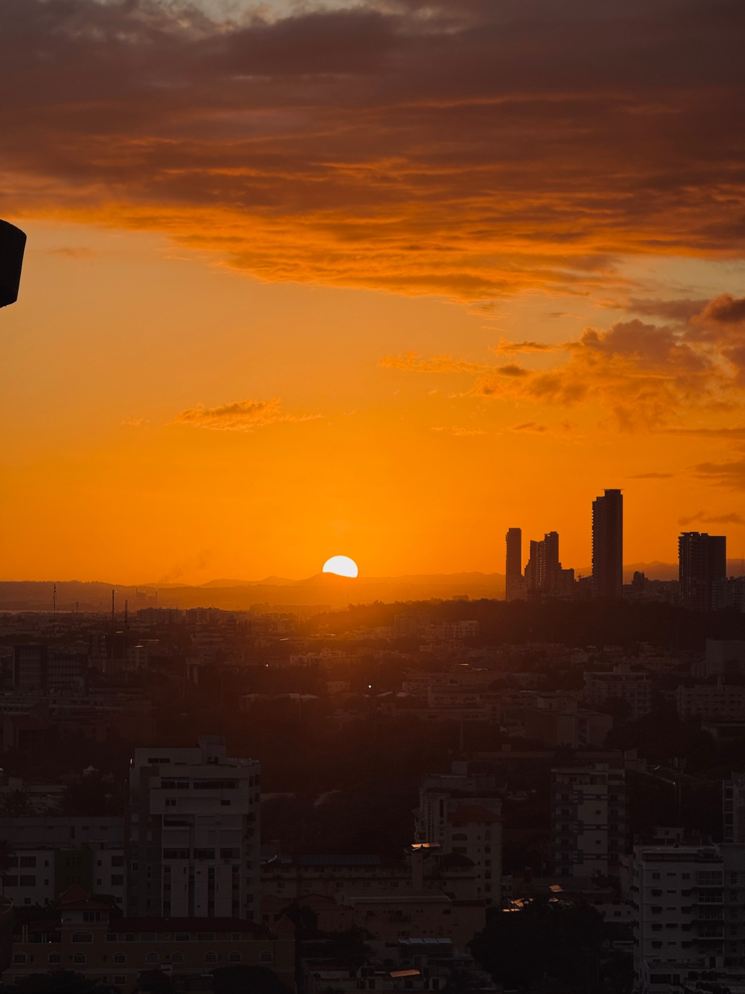 An orange sunset over Santo Domingo