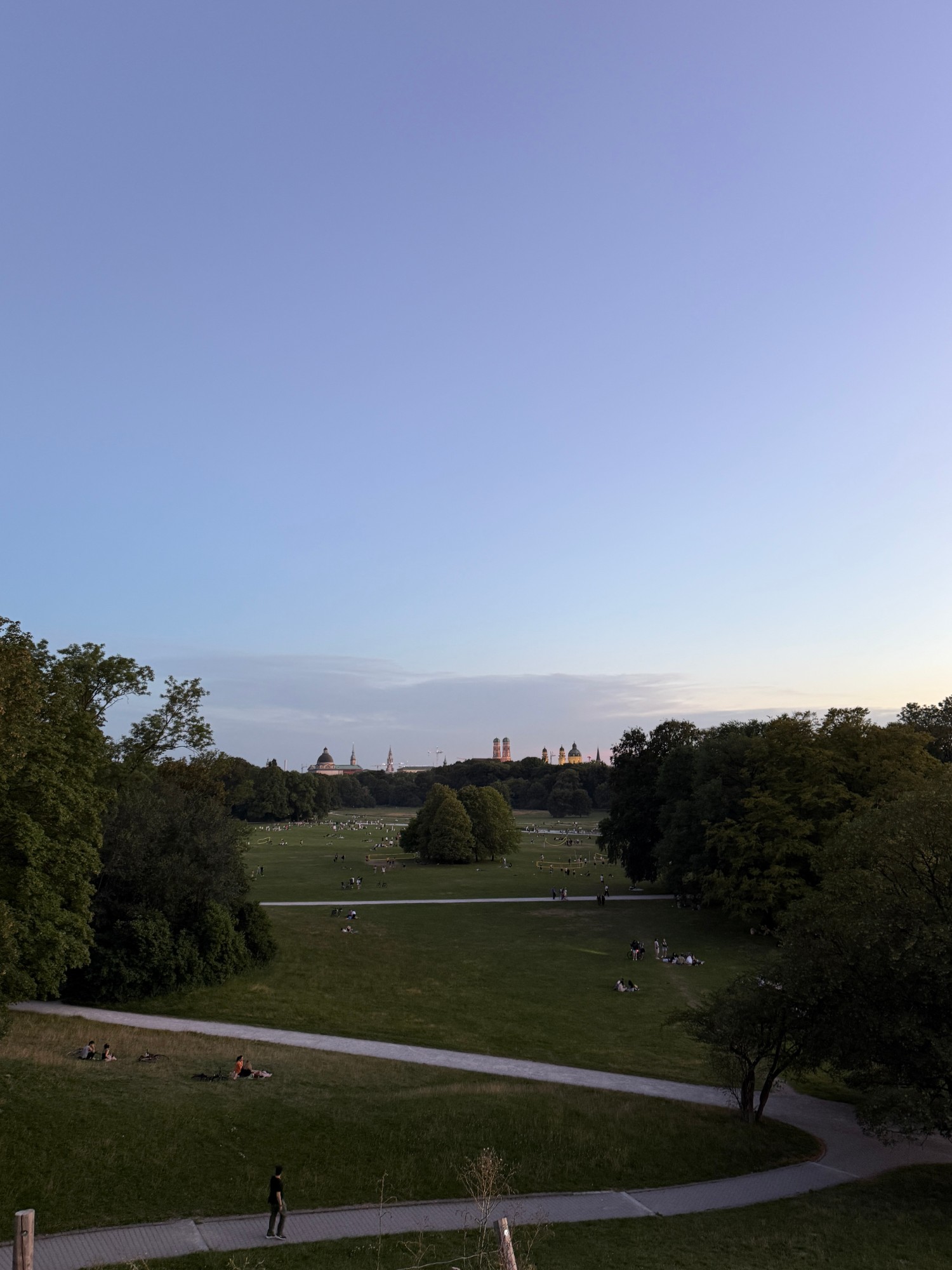 Evening over the Englischer Garten, with Munich's towers in the distance
